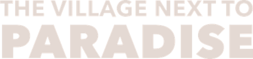The Village Next to Paradise logo