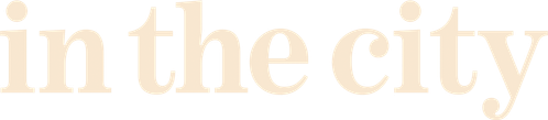 In the City logo